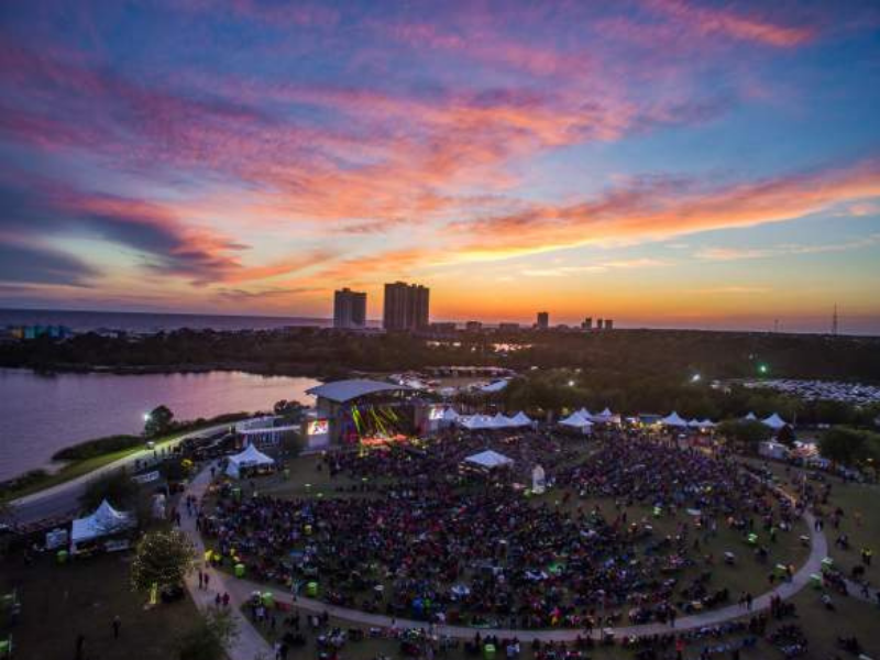 aerial view of crowd at sunset at aaron bessant park